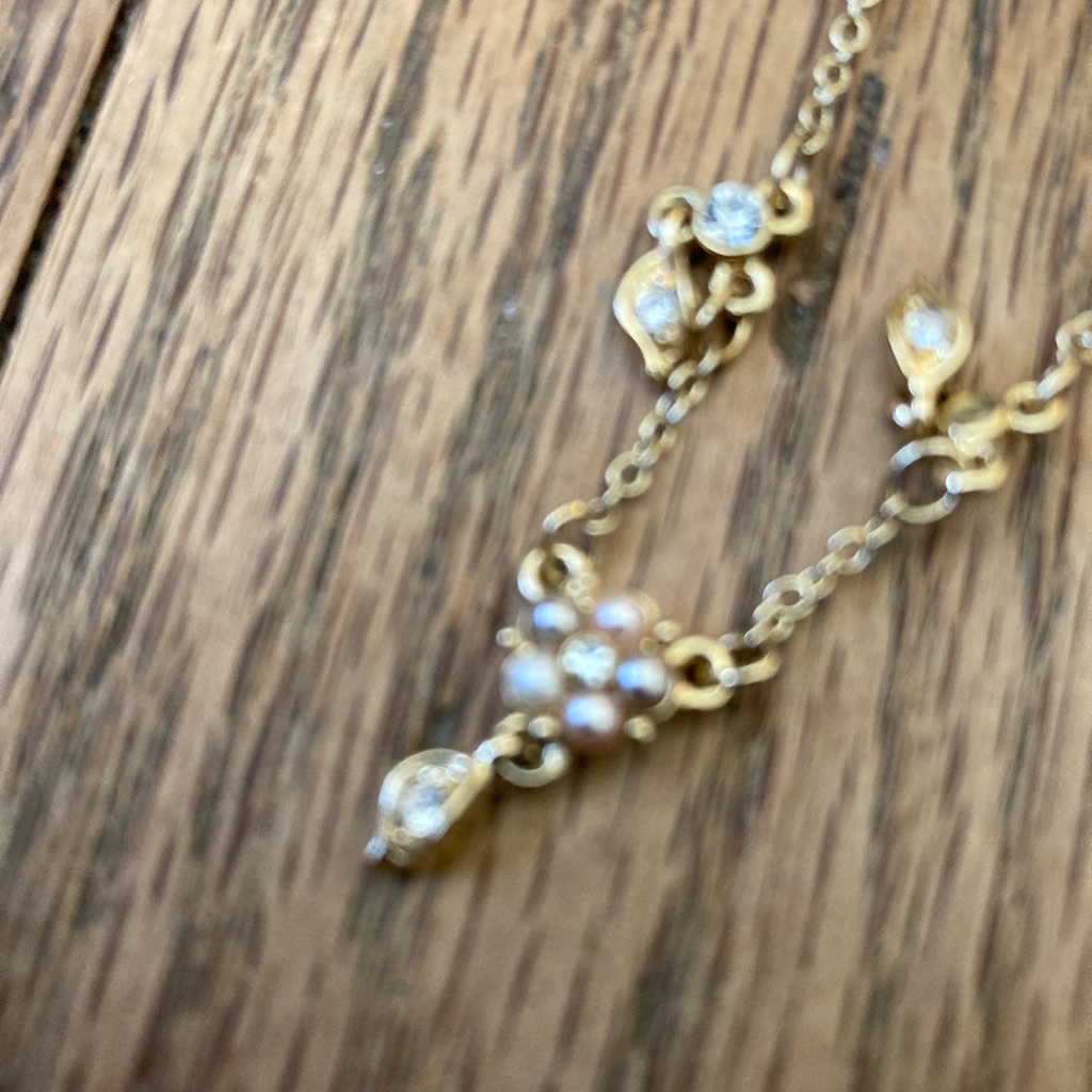 Elegant Gold And Pearl Floral Necklace